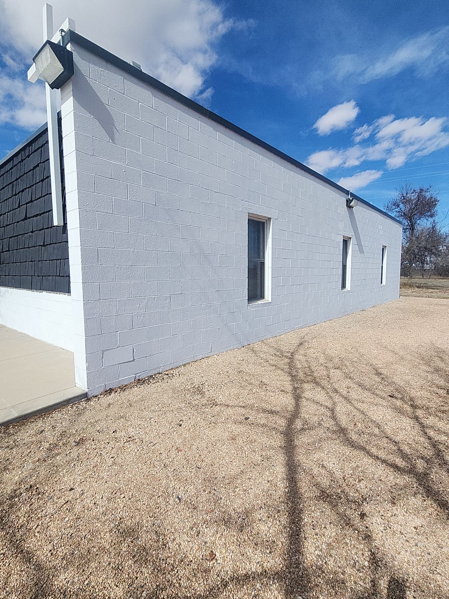 Honoring Tradition: Exterior Repaint of Our Lady of the Plains