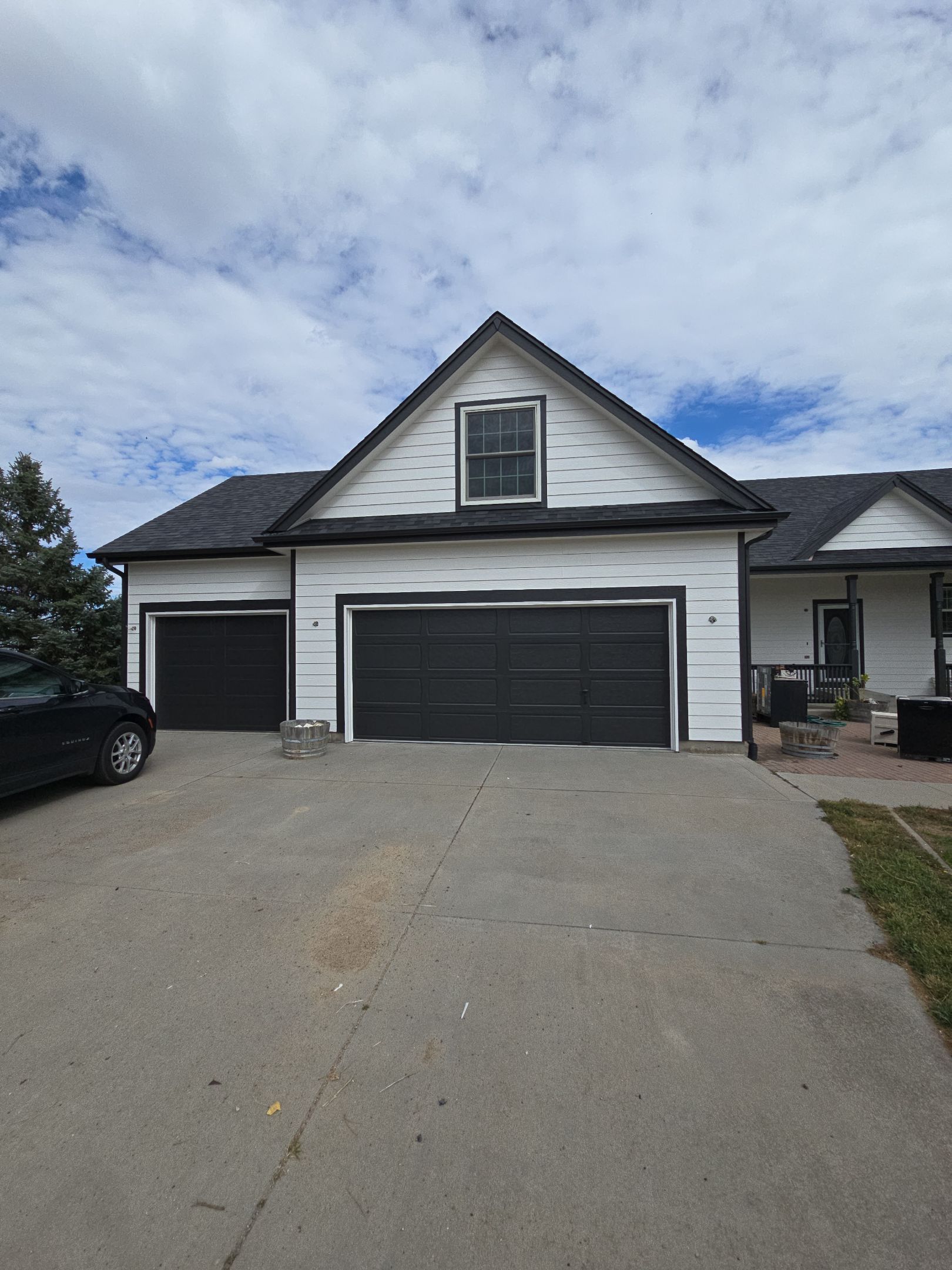 From Faded to Timeless: White & Black Exterior Renewal